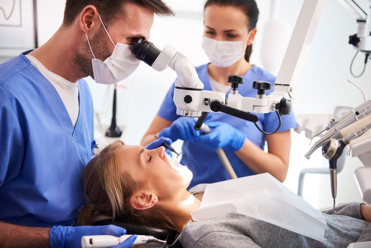 Oral surgery being performed in a modern treatment room in Nobleton, ON
