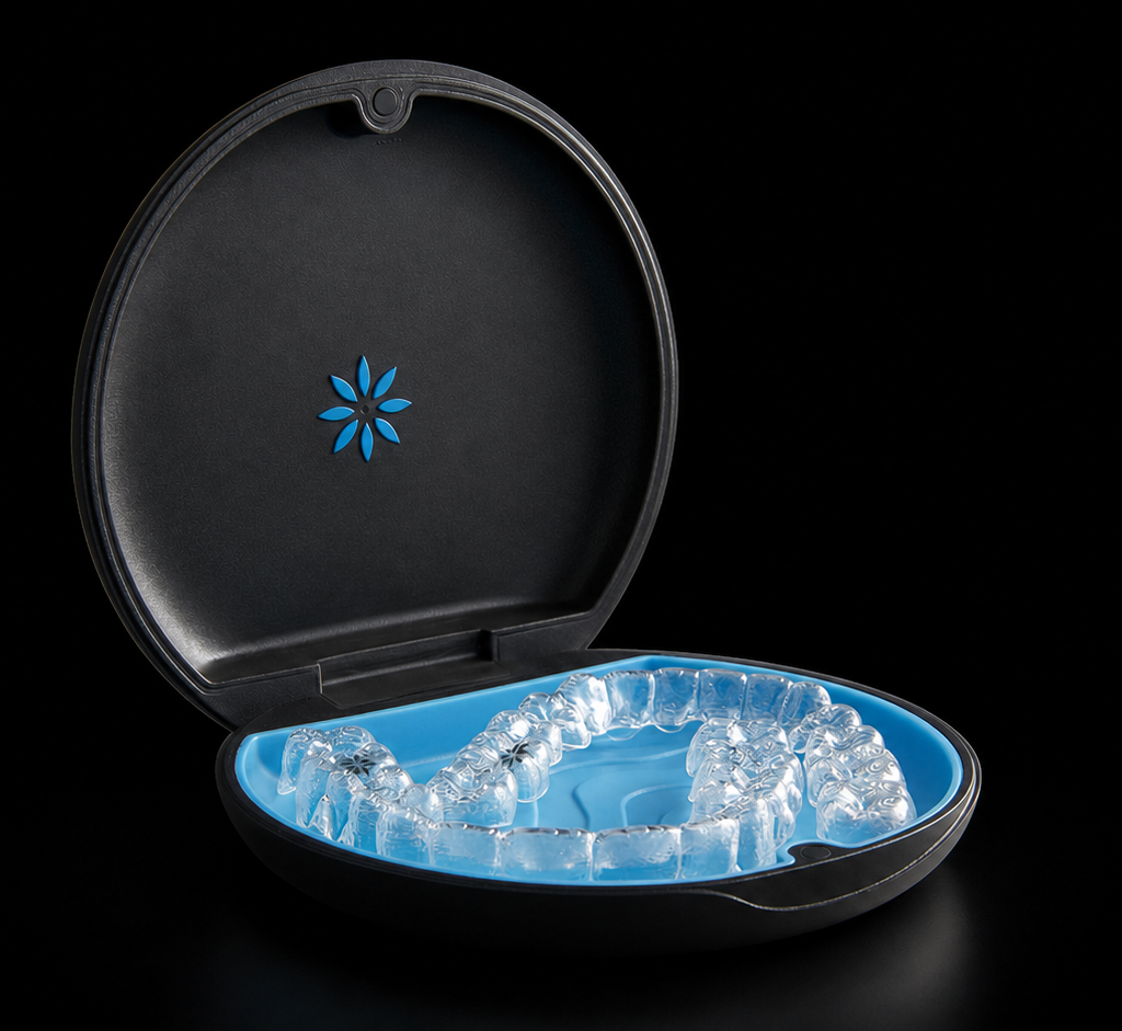 Invisalign in Humble, TX | Aroma Dental Invisalign at Aroma Dental in Humble, TX: an Invisalign provider showing a patient their digital treatment plan and clear aligner